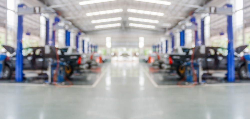 Car,Service,Centre,Auto,Repair,Workshop,Blurred,Panoramic,Background