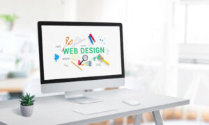 “web design” text prominently featured on a computer monitor
