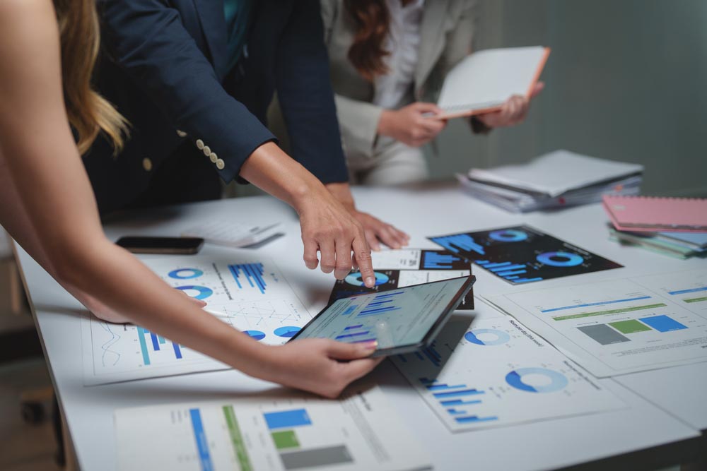 analytics for seasonal campaign performance being reviewed at a board meeting