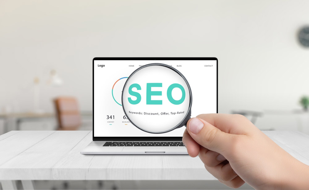 the letters “SEO” seen through a magnifying glass